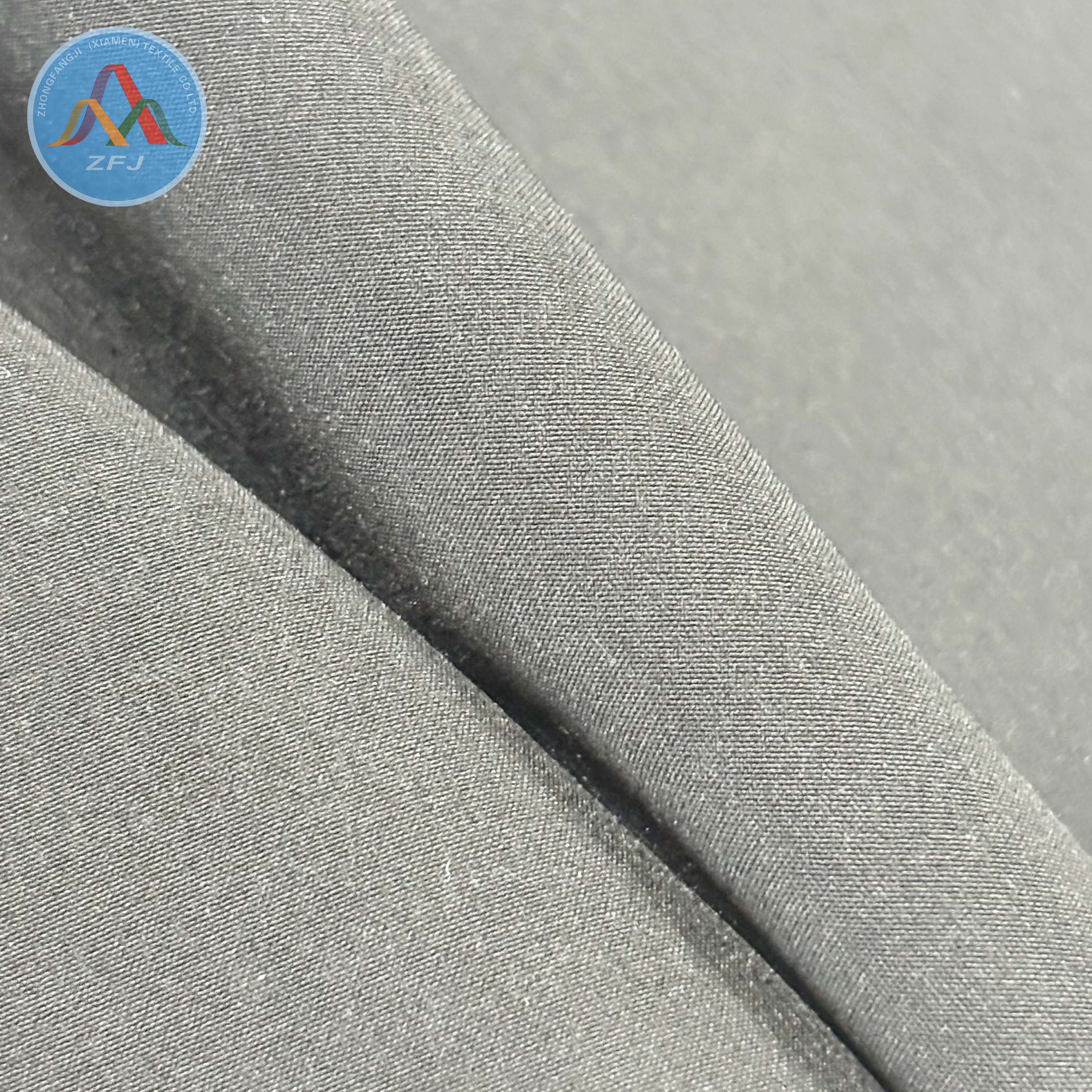 100D 4-Way Stretch Soft Shell Fabric with TPU Membrane And Jacquard Polar Fleece Backing