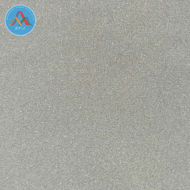 100D 4-Way Stretch Soft Shell Fabric with TPU Membrane And Jacquard Polar Fleece Backing