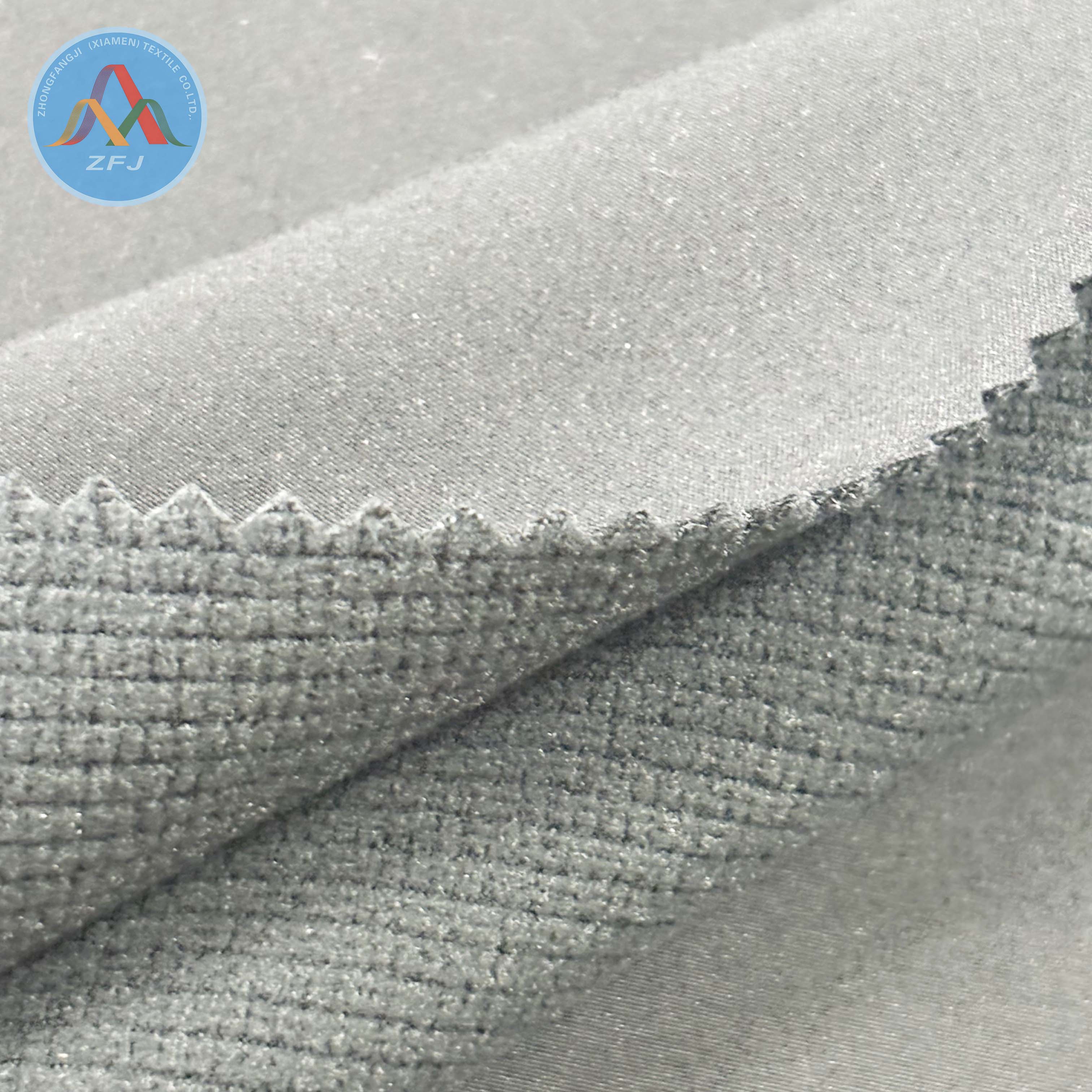100D 4-Way Stretch Soft Shell Fabric with TPU Membrane And Jacquard Polar Fleece Backing