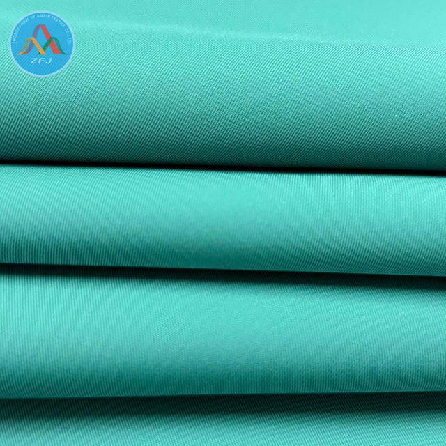 Eco Friendly Twill Functional Fabric with 10K/10K PU Clear Coating for Outdoor Workwear Apparel